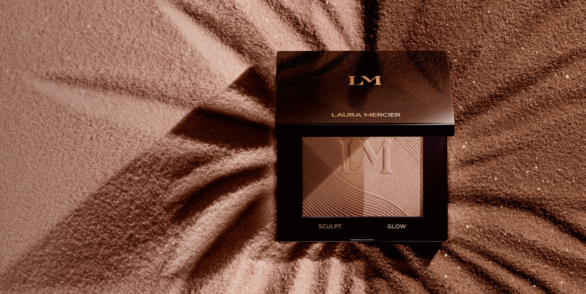 Stylized image of Laura Mercier Bronze Color Infusion with the background being a light to bronze gradient swatch of the product